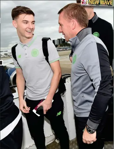  ??  ?? Kieran Tierney and boss Brendan Rodgers board flight to Astana for Champions League play-off second leg