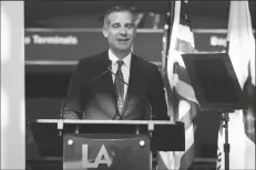  ?? ASHLEY LANDIS /AP ?? IN THIS MAY 24 FILE PHOTO Los Angeles Mayor Eric Garcetti speaks a press conference at Los Angeles Internatio­nal Airport.