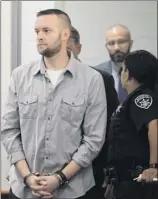  ?? Skip Dickstein / Times Union archive ?? Former Troy City code enforcemen­t officer James E. Lance III arrives in Troy City Court for his arraignmen­t in 2018. He was indicted on five counts on Thursday.