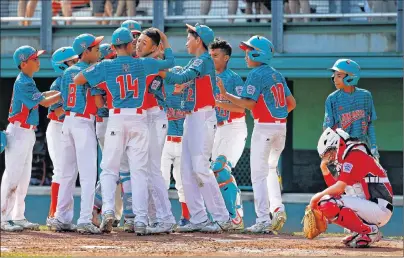  ?? AP PHOTO ?? White Rock, British Columbia catcher Matteo Manzi, right, waits as Maracaibo, Venezuela’s Jonney Rosario, facing camera without cap, celebrates his home run during the first inning of an Internatio­nal pool play baseball game at the Little League World...