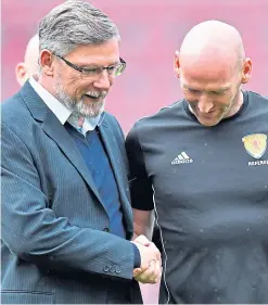  ?? Picture: SNS Group. ?? Craig Levein with ref Bobby Madden.