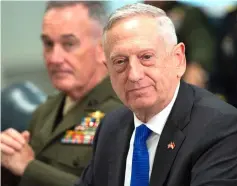  ??  ?? File photo shows Mattis alongside chairman of the Joint Chiefs of Staff General Joseph Dunford (left) as he holds a meeting at the Pentagon. — AFP photo