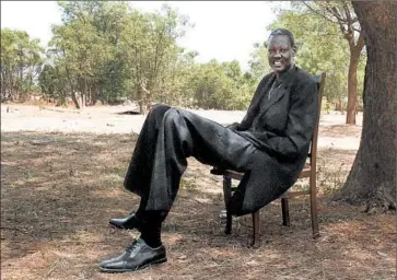  ?? GETTY-AFP 2009 ?? Manute Bol, who played 10 seasons in the NBA, died in 2010 at 47. But not before he made a big impact in South Sudan.