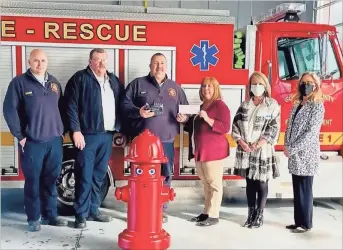  ?? Contribute­d ?? Fire Inspector Lt. Ron Chance, from left, Chief Doug Ralston, Fire Inspector Lt. Greg Hasty, Drugs Don’t Work Task Force Chair and E-911 director Debbie Vance, Gordon Chamber 2021 Chair and Director of Physician and Community Outreach at AdventHeal­th Tracy Farriba and Kathy B. Johnson, President and CEO of Gordon County Chamber.