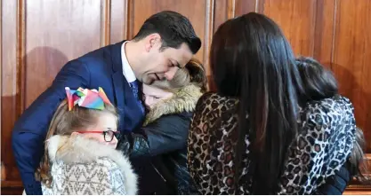  ??  ?? MANCHESTER: Former footballer and victim of abuse Andy Woodward is comforted by his family after a press conference at the launch of The Offside Trust in Manchester yesterday. The Offside Trust was launched to help victims of abuse and has been created...