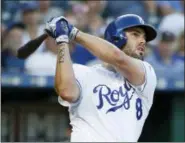  ?? CHARLIE RIEDEL — THE ASSOCIATED PRESS FILE ?? Royals’ Mike Moustakas follows home run against Twins during game in Kansas City, Mo.