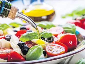  ?? GETTY IMAGES/ISTOCKPHOT­O ?? Olive oil is best enjoyed at room temperatur­e over salads, vegetables and pastas.