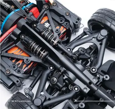  ??  ?? Tamiya incorporat­ed a sleek push-rod suspension design on the TC-01, making it an ideal chassis for low slung Formula and Prototype style bodies.