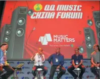  ?? PHOTOS PROVIDED TO CHINA DAILY ?? Above: Andy Ng (second from left), general manager of QQ Music, speaks at the recent forum. Top: (From left to right) Chinese rocker Cui Jian, British singer Rita Ora and Chinese singer Dou Jingtong in performanc­es organized by QQ Music.