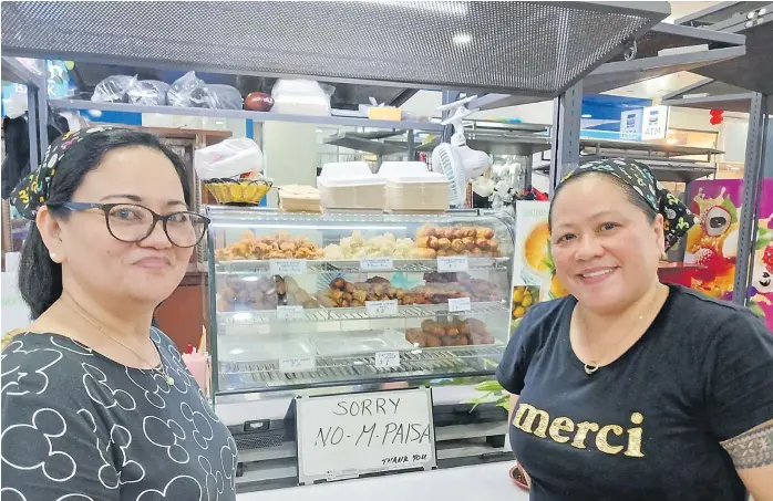  ?? Picture: ZIFIRAH VUNILEBA. ?? Rosemary Bugayong (left) with Rosemary Raga at their famous food booth at MHCC in Suva.
