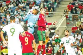  ?? AFP ?? Cristiano Ronaldo (right) vies for the ball with Republic of Ireland’s goalkeeper Gavin Bazunu during the FIFA World Cup Qatar 2022 European qualifying round group A football on Wednesday.