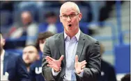  ?? Stephen Dunn / Associated Press ?? UConn coach Dan Hurley says his Huskies look “like a hungry team that’s finally kind of healthy again and excited to attack the schedule here.” UConn will face off with Butler twice this week.