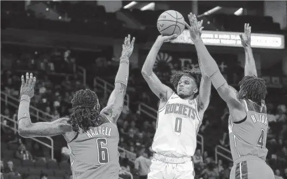  ?? Photos by Yi-Chin Lee / Staff photograph­er ?? No. 2 overall pick Jalen Green, center, will be the focal point of a young Rockets team this season as the franchise continues its rebuild after bottoming out.