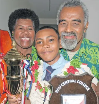  ?? Photo: Ronald Kumar ?? First Bau Central College prize giving ceremony 2018 Dux Epeneri Tanuku with his grandparen­ts, Paulini and Solomone Cati at Mokani, Bau, Tailevu, on October 17, 2018.