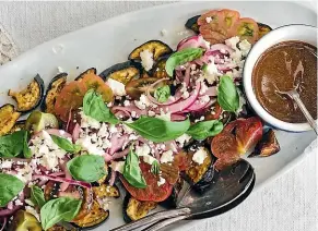  ??  ?? When roasting the eggplant for this salad, be generous with the olive oil.