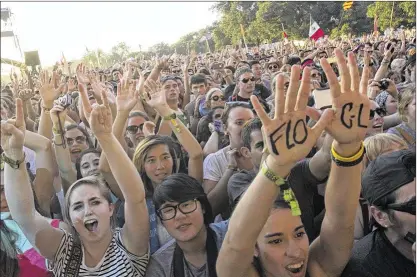  ??  ?? Fans watch Florence and the Machine’s show at a 2012 Austin City Limits Music Festival. Her band will close out this year’s ACL Festival.
AMERICANST­ATESMAN
2012