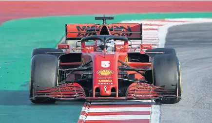  ??  ?? Ferrari’s Sebastian Vettel drives during a test.