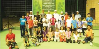  ?? – Supplied Photo ?? ALL SMILES: The participan­ts of the Oman Tennis Associatio­n 4th Monthly Junior Tennis tournament with the chief guests and officials.