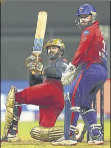  ?? BCCI ?? RCB’S Dinesh Karthik plays a shot during his match-winning unbeaten 66 off 34 balls against Delhi Capitals at the Wankhede stadium on Saturday.