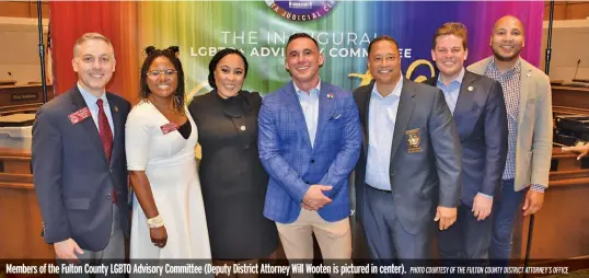  ?? PHOTO COURTESY OF THE FULTON COUNTY DISTRICT ATTORNEY’S OFFICE ?? Members of the Fulton County LGBTQ Advisory Committee (Deputy District Attorney Will Wooten is pictured in center).