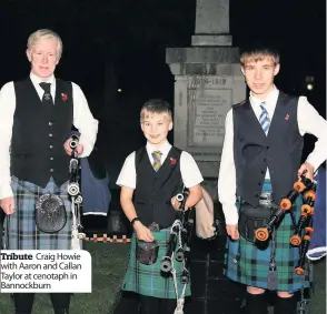  ??  ?? Tribute Craig Howie with Aaron and Callan Taylor at cenotaph in Bannockbur­n