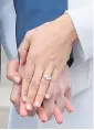  ??  ?? Nailed it: a flash of the engagement ring revealed her chic manicure. Meghan has been practising yoga, above, since she was a child, and is often seen with her mat, right