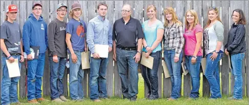  ?? Booster photo by Jason Kerr ?? The Southwest Regional Judging Competitio­n top 10, pose for a photo with United Farmers of Alberta delegate Larry Caswell. The top 10 were: first Morgan Rampton, second Savannah Cheney, third Shanna Klassen, fourth Kaylee Duncan, fifth Derek Doerksen,...