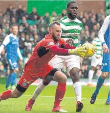  ??  ?? St Johnstone’s Alan Mannus in action against Celtic.
