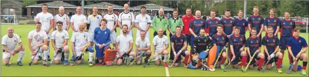  ??  ?? Ashford’s men’s team (blue) line-up alongside Bobby’s Boys ahead of the game which Bobby’s Boys won 9-5