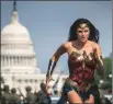  ?? Associated Press photo ?? This image released by Warner Bros. Pictures shows Gal Gadot as Wonder Woman in a scene from “Wonder Woman 1984.”
