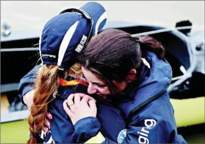  ?? PHOTO: GETTY IMAGES ?? Zoe De Toledo ( right) is comforted after an eventful Boat Race that saw Oxford come out second best