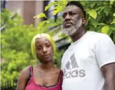  ?? PAT NABONG/SUN-TIMES ?? Dnigma Howard, 18, and her father, Laurentio Howard