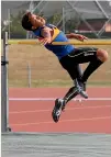  ?? ?? Brothers Lwamba, left, and Temwa Chileshe have different strengths, ideal for a doubles combinatio­n. Right, Temwa competes in the high jump at a Canterbury athletics championsh­ips in 2014.