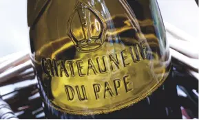  ??  ?? Above: French anti-fraud officers seized 1.3 million bottles of wine falsely labelled as Ch‰teauneuf-du-Pape