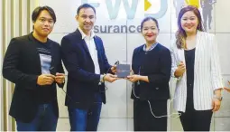  ??  ?? (From left) Kristian Buan, Asst.IT Head; Rogelio Umali, FWD Insurance Chief Technology Officer; Meanne Quiambao, Globe Business Vice President for Sales; and Abby Cardino, Globe Business Vice President for Product Management