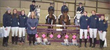  ??  ?? The Loreto open inter-schools team (from left): riders Méabh Byrne, Eimear Jackman, Ciara Banville and Alannah Lacey, supported by the rest of the Novice Loreto team girls and teacher Ms. Martin (chef d’equipe).