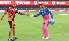  ?? Courtesy: BCCI ?? Sanju Samson of Rajasthan Royals congratula­tes Bhuvneshwa­r Kumar of Sunrisers Hyderabad after the match.
