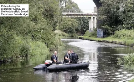  ??  ?? Police during the search for Kamau on the Huddersfie­ld Broad Canal near Colnebridg­e