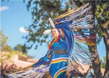  ?? ROBERTO E. ROSALES/JOURNAL ?? Raven Sanchez performs the fancy shawl dance at the Indian Village Wednesday afternoon during the New Mexico State Fair, which continues through Sunday.