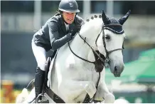  ?? JIM WELLS ?? Molly Ashe rode D’Arnita to victory in the jump-off during the Kubota Cup at the Spruce Meadows North American in Calgary Wednesday.