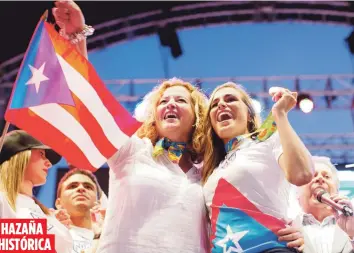  ?? Archivo ?? Puig, en una celebració­n junto a la presidenta del Copur, Sara Rosario, hizo historia al conseguir la primera medalla de oro para la Isla en juegos olímpicos en Río 2016.