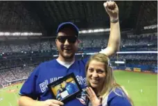  ??  ?? Stawychny proposed to girlfriend Katie Bookman at Thursday’s Jays game.