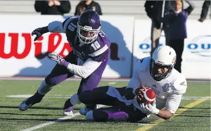  ?? CRAIG GLOVER/FILES ?? Western Mustangs linebacker Jean-Gabriel Poulin, left, from St-Nicolas, is expected to immediatel­y improve the Als’ special teams.