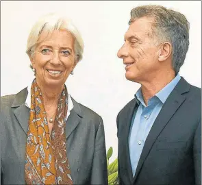  ?? CEDOC PERFIL ?? SONRISAS. Entre Macri y la directora del FMI, Christine Lagarde.