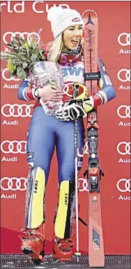  ?? GETTY ?? Mikaela Shiffrin of the U.S. celebrates on podium after winning World Cup slalom in Killington, Vt.