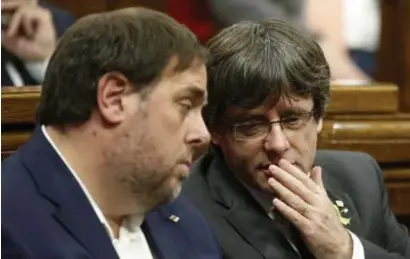  ?? FOTO AP ?? Vicepremie­r Oriol Junqueras en minister-president Carles Puigdemont.