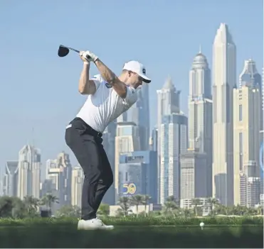  ?? ?? Calum Hill in action during the recent Hero Dubai Desert Classic and, below, Graham Walker, who has been helping the Scot with his short game