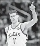  ?? Nick Wass Associated Press ?? BROOK LOPEZ, a 7-foot center, has made 38.3% of his three-point shots.