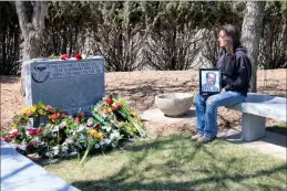  ?? HERALD PHOTO BY ALEJANDRA PULIDO-GUZMAN ?? Jackie Fuhrmann remembers her father Jim Jameson who passed away in 2014 while at work, during the National Day of Mourning Thursday at the workers memorial site at the Mountain View Cemetery.