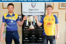  ?? Pic: Eamonn McMunn ?? Eugene Mullen (Easkey) and Aaron Nicholson (Owenmore Gaels) with the Lola Montez Junior A Championsh­ip Cup prior to next Sunday’s Final in Cloonacool at 12:30pm.